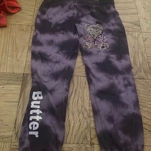 Purple sweatpants with teddy bear